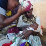 Nurse dispenses a polio vaccine